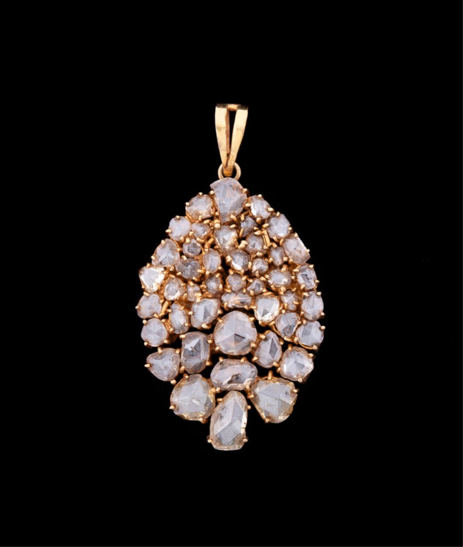 DIAMOND & 14K YELLOW GOLD LEAF PENDANT: Diamond teardrop leaf form pendant in yellow gold accented with prong set rose cut diamonds, ranging 6.2-2.0mm. Tested 14K gold. Provenance: The Estate of Edward and Mary Ellen Gillespie, Mount Pleasa