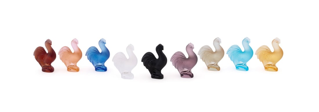 LALIQUE, 9 ROOSTER FIGURINES, ASSORTED COLORS: Lalique (French, founded 1888), 20th / 21st century. Group of nine multi-colored crystal rooster "coq" figurines, in assorted colors, all appropriately marked "Lalique France" to side. Provenance: Pri