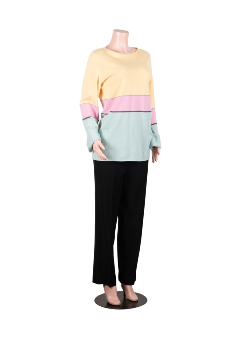 CHANEL CASHMERE SWEATER AND BLACK PANT SET: Chanel (French, founded 1910). One pastel color blocked yellow, pink, and blue cashmere sweater from 1999, and one pair of black trouser pants from 1995 with partial elastic waistband and two CC logo