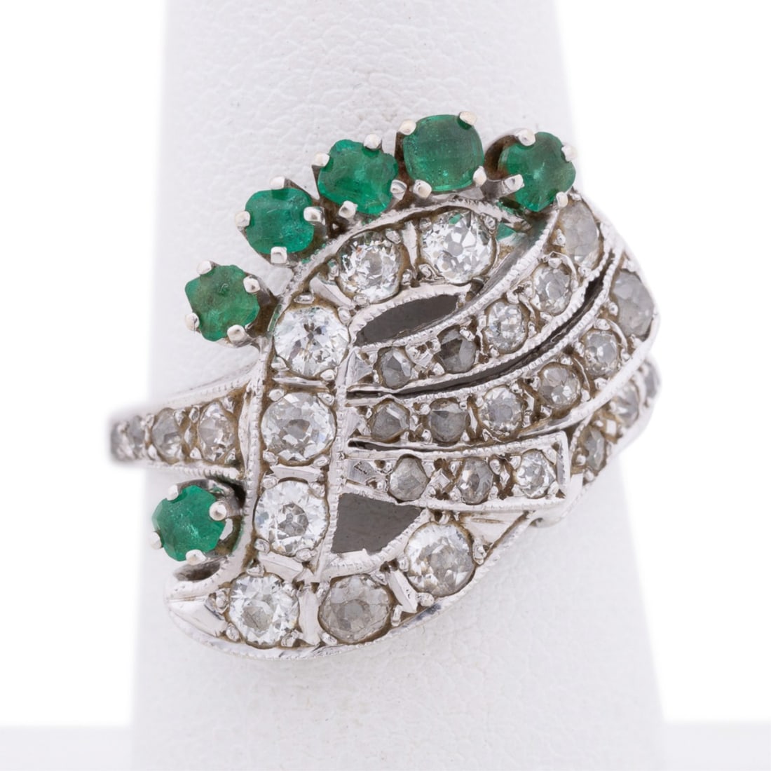 EDWARDIAN EMERALD AND DIAMOND RING, 14K WHITE GOLD: Edwardian (circa 1915) emerald and diamond ring featuring (6) round translucent green emeralds weighing approximately 0.32 total carats and (30) old mine cut / rose cut diamonds weighing approximately