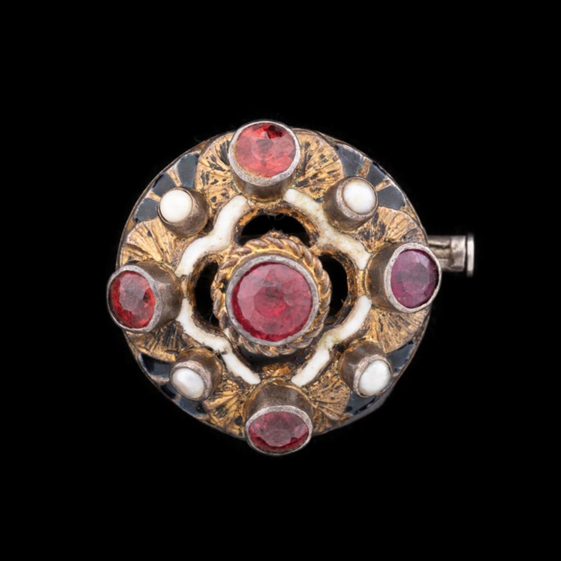PINK TOURMALINE, ENAMEL & SEED PEARL BROOCH: Round enamel, seed pearl, and pink tourmaline pin, centering on (1) round cut pink tourmaline (5.5 mm) within a gold plated and white & black enamel pin, accented by (4) seed pearls and (4) round cut