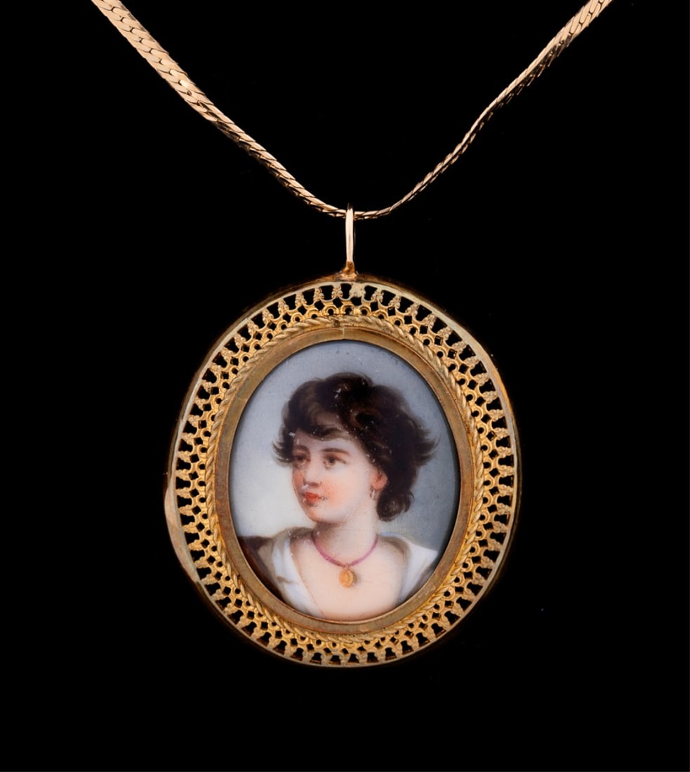 OVAL CAMEO PORTRAIT & 14K YELLOW GOLD NECKLACE: Hand-painted porcelain portrait and 14k yellow gold pendant necklace with gold metal framed oval portrait cameo of girl, held on 14k yellow gold chain. Pendant apparently unmarked, chain marked approp