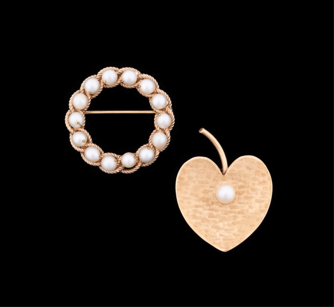 TWO VINTAGE PEARL BROOCHES IN 14K YELLOW GOLD: Group of two vintage pearl pins in 14k yellow gold comprising one Krementz heart-shape leaf and one wreath motif. Heart having stamped maker's mark and 14k, wreath stamped "A&Z / 14k". Provenance: Pri