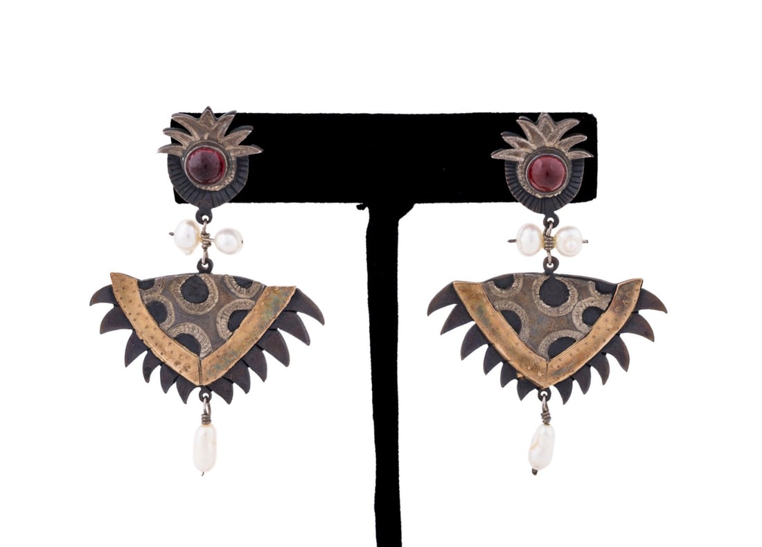PAT GARRETT GARNET & PEARL DANGLE EARRINGS: Pat Garrett (Contemporary). Pair of dangle earrings in mixed metal with 14k yellow gold vermeil accents, each comprising a cabochon garnet and three (3) cultured pearl accents. Stamped with maker's ma
