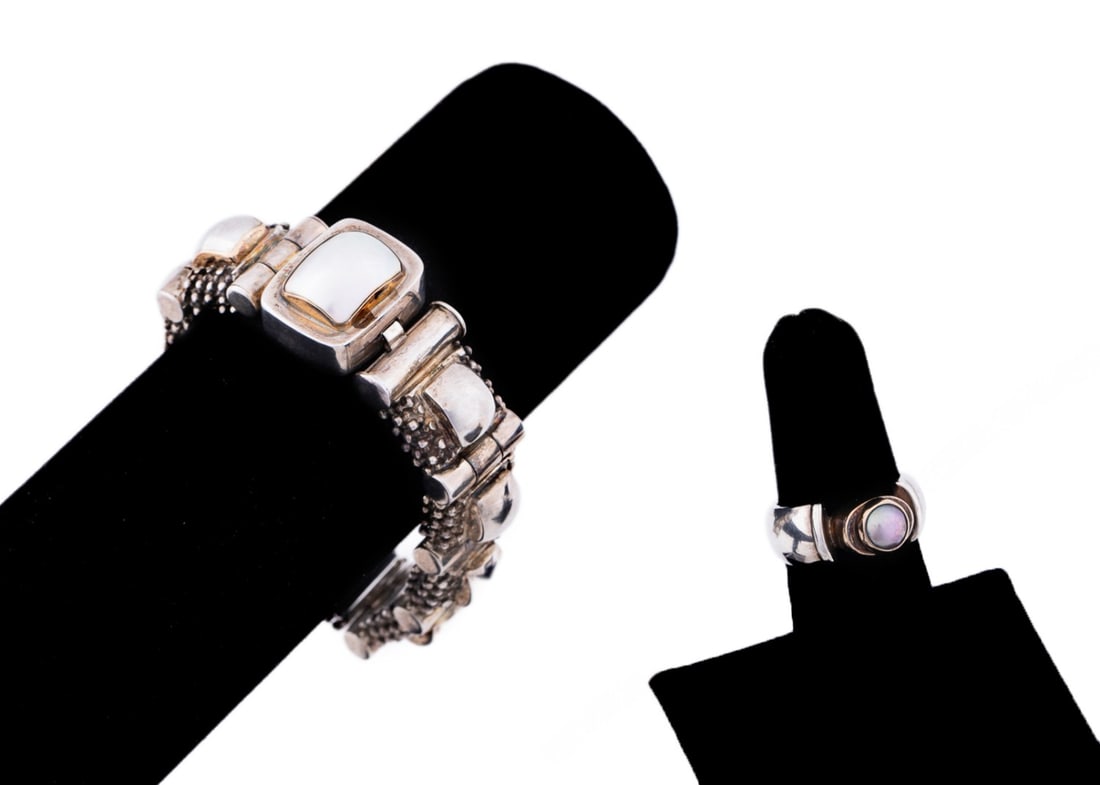 MICHAEL DAWKINS STERLING BRACELET AND RING SET: Michael Dawkins (American, founded late 1980s). Studio Modern bracelet and ring jewelry set in sterling silver comprising one white pearl mounted and modern link bracelet and one black pearl two-tone