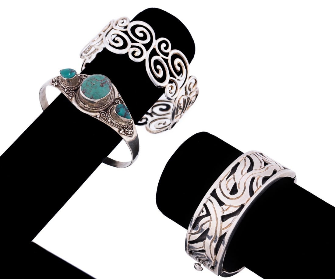 THREE NAVAJO STERLING SILVER BRACELETS (1 of 18)