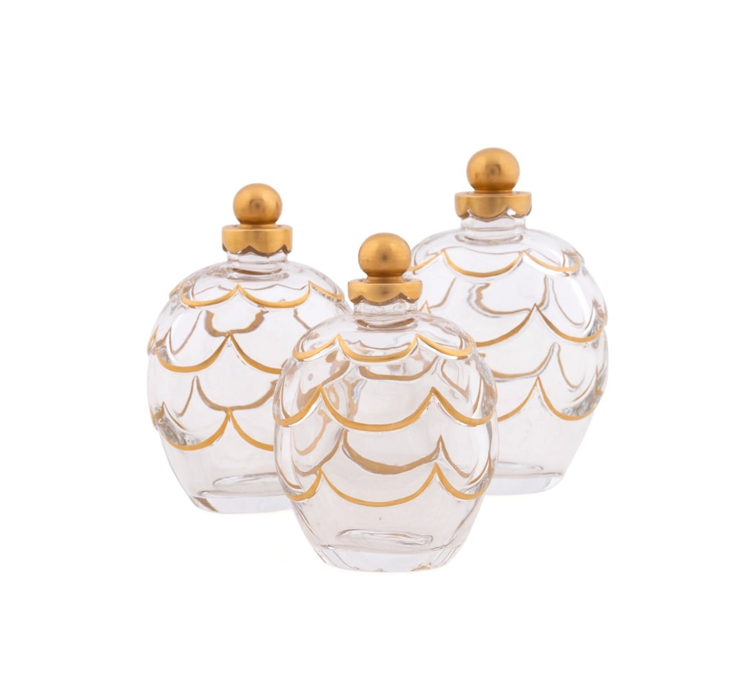 GEORGES CHEVALIER FOR BACCARAT, 3 SCENT BOTTLES: Georges Chevalier (French, 1894-1987) for Baccarat (French, founded 1764), late 20th to early 21st century. Set of three limited edition colorless crystal Art Deco style graduated perfume or scent bot