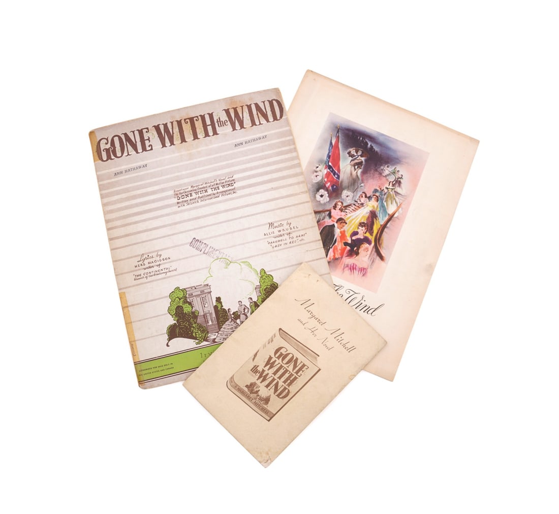 'GONE WITH THE WIND' PROGRAM, BOOKLET, SHEET MUSIC: "Gone With the Wind" group of ephemera comprising one 1939 souvenir program for the film, featuring beautiful colored lithographs of the film and its stars; one 1936 booklet on "Margaret Mitchell and