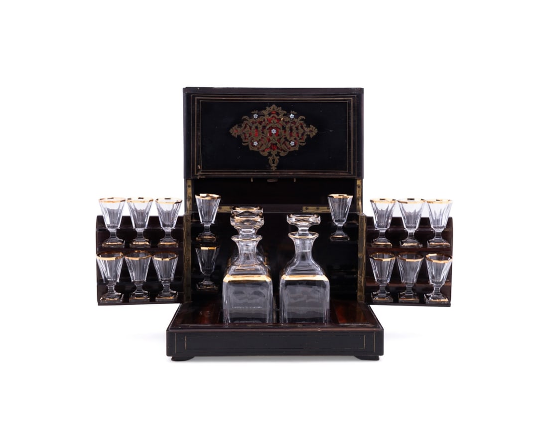 NAPOLEON III BOULLE INLAID EBONIZED CAVE A LIQUEUR: French, second half 19th century. Napoleon III ebonized boulle work cave a liqueur, having brass, faux shell, and mother-of-pearl inlay, lift-top and swing-out sides with storage to the base, rosewood