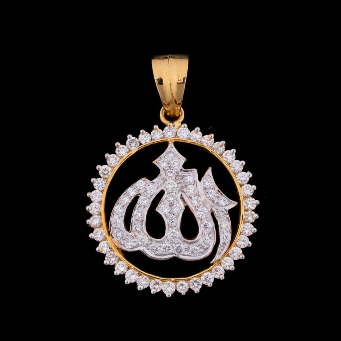 DIAMOND AND 18K YELLOW GOLD ALLAH PENDANT: Diamond pendant featuring (79) round brilliant cut diamonds weighing approximately 1.27 total carats (VS-2 clarity, G/H color) in shape of Arabic symbol for Allah and surrounding halo, set in 18k yell