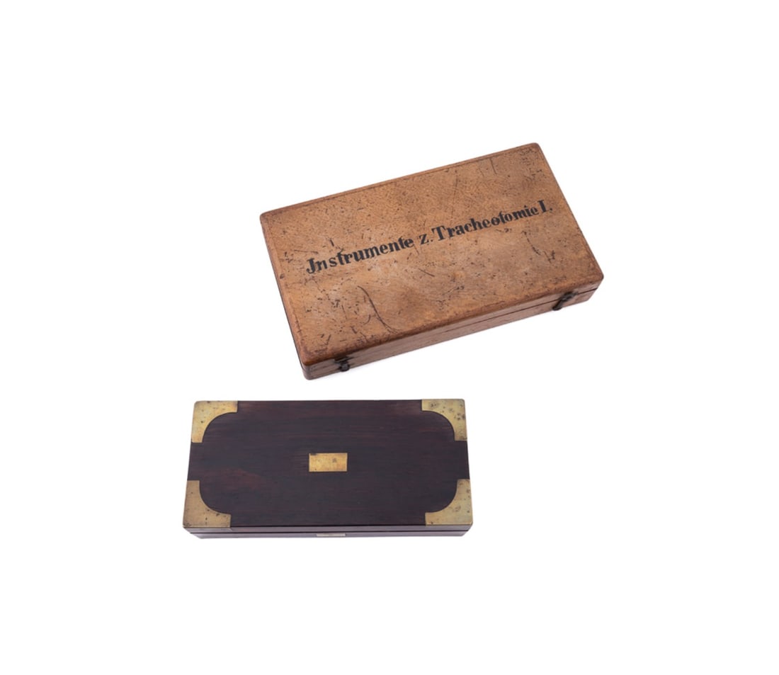 2 BOXED SURGICAL SETS, PETER ROSE & H. KATSCH: Peter Rose (American, founded 1822) seven piece trepanning surgical kit in a rosewood box, company label to interior. H. Katsch (German, founded 1880s) 14 piece tracheotomy tools in an antique case, i