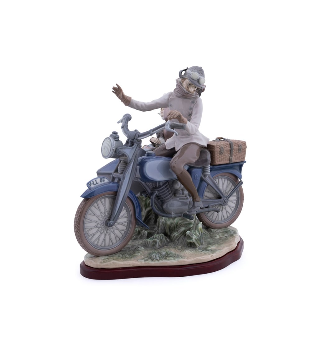 LLADRO, 'OLD FASHIONED MOTORIST', 1986-1985: Salvador Furio (Spanish, born 20th century) for Lladro (Spanish, founded 1953). Large porcelain figure, "Old Fashioned Motorist" (number 5161; introduced 1986 - retired 1985), modeled as a man on a
