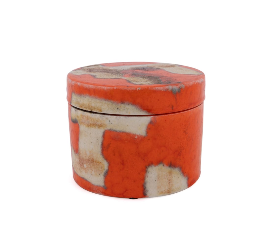 GUIDO GAMBONE, ORANGE LIDDED CERAMIC JAR: Guido Gambone (Italian, 1909-1969). Orange lidded jar - 20th century, glazed stoneware, signed to underside with donkey mark. Approximate dimensions: h. 4.25", dia. 5.375".