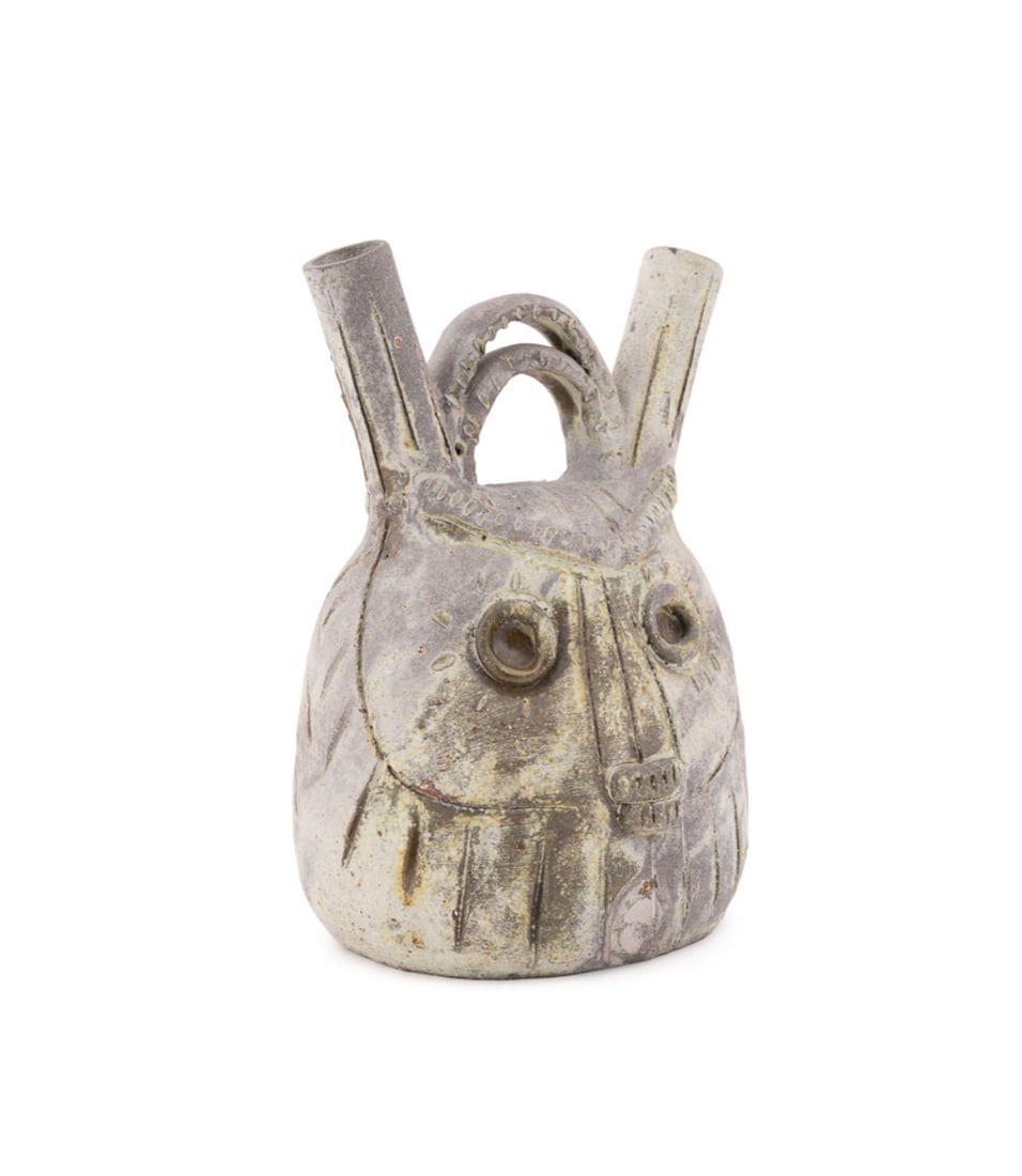 SARDINIAN DOUBLE FACED CERAMIC VESSEL, 20TH C.: Italian school, 20th century. Sardinian anthropomorphic Janus-faced partially glazed ceramic vessel, inscribed labels to underside including "Made in Sardinia / Italy". Approximate dimensions: h.