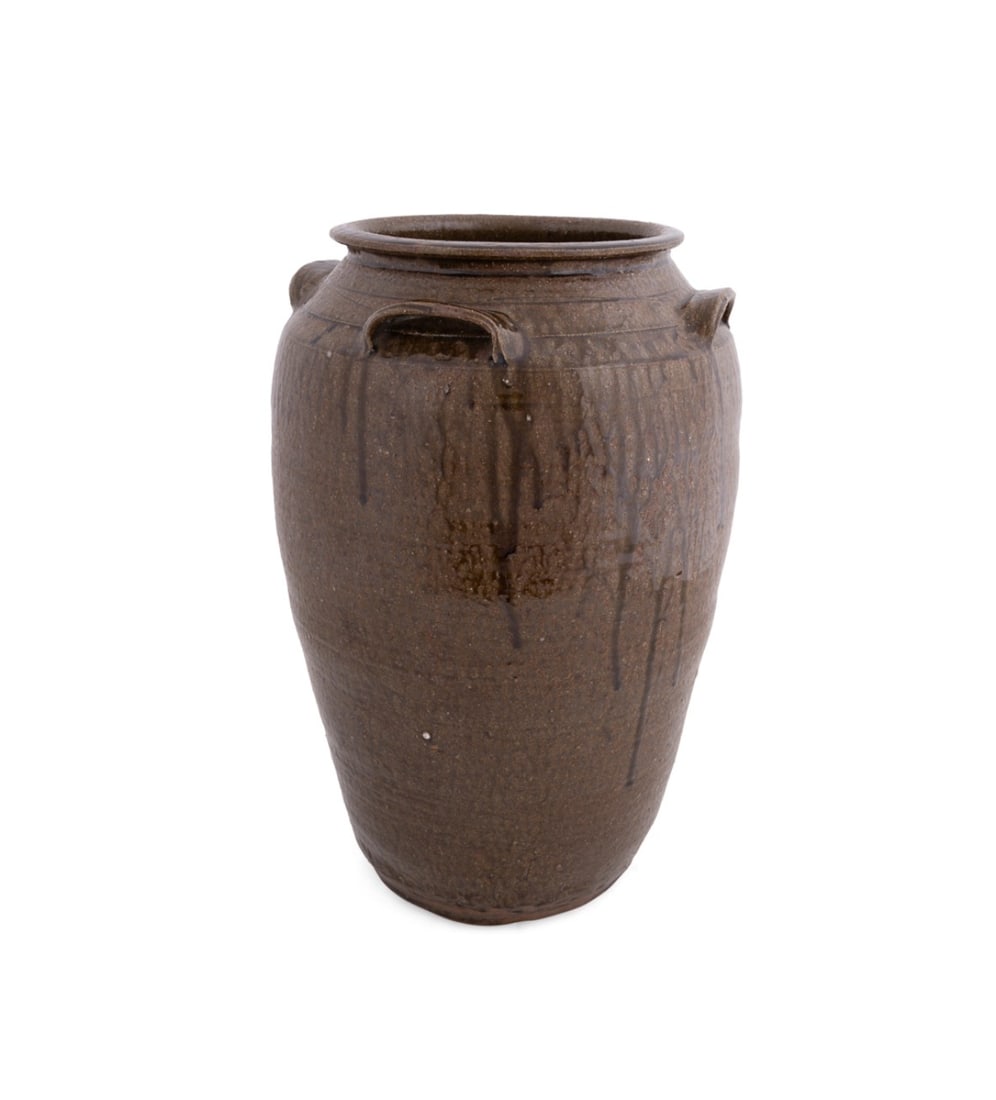 AMERICAN SOUTH LARGE BROWN GLAZE POTTERY JAR: American South, 20th century. Large brown glaze pottery jar with four handles, apparently unmarked. Approximate dimensions: h. 20", widest dia. 13", opening dia. 8.25".