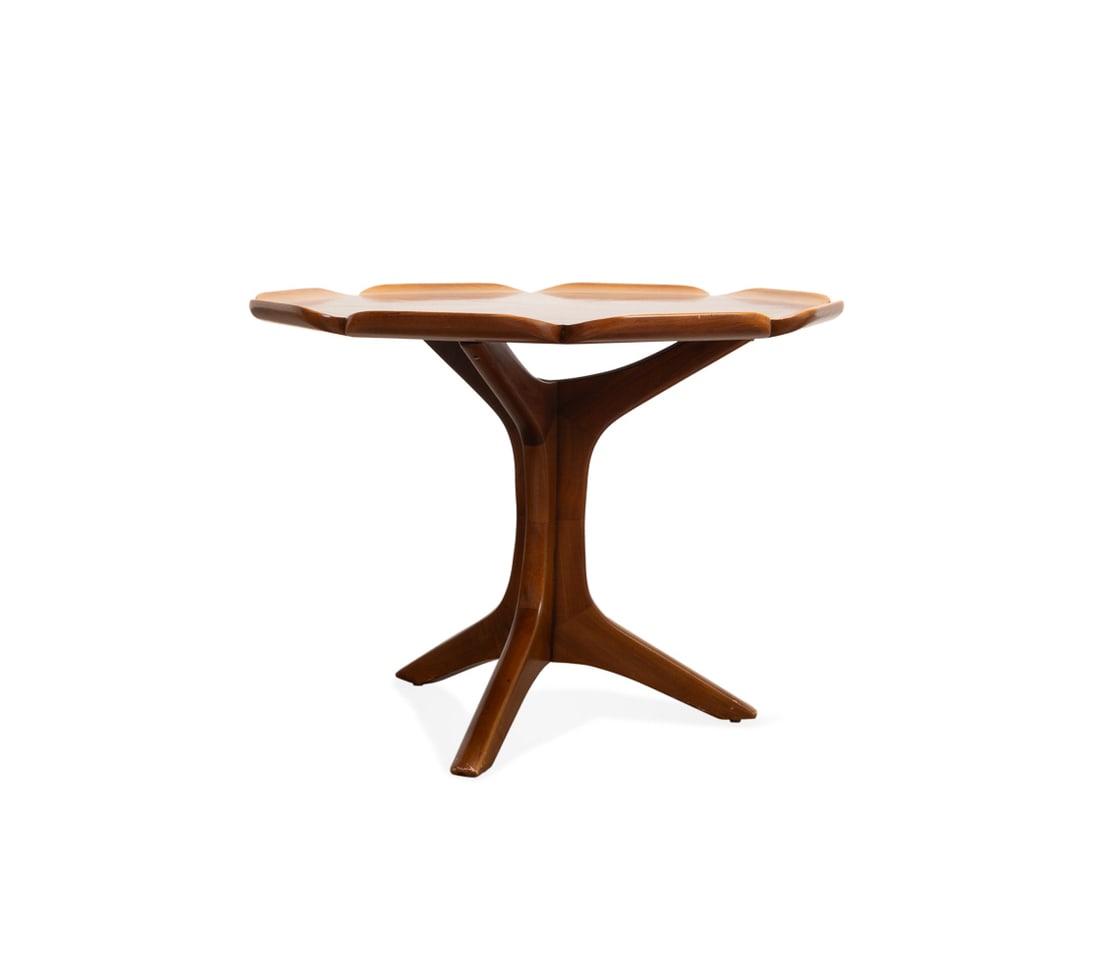 MID CENTURY MODERN TWO-TONE FLORIFORM END TABLE: American, mid 20th century. Mid Century Modern walnut veneer floriform side or end table, having an octagon top with upturned edges and raised on tripod base with splayed legs, apparently unmarked. Ap