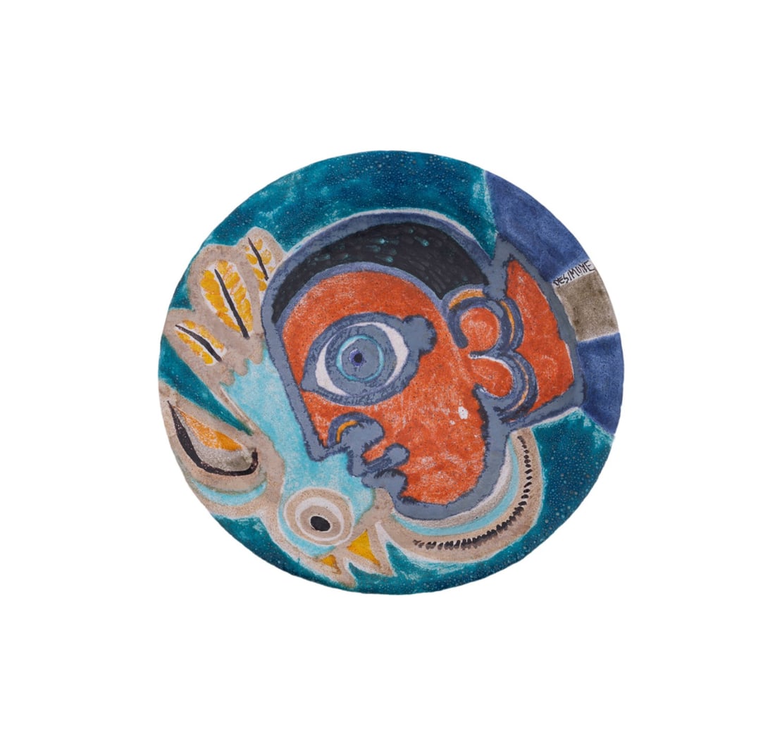 GIOVANNI DE SIMONE, GLAZED CUBIST STYLE CHARGER: Giovanni De Simone (Italian, 1930-1991). Glazed pottery charger hand painted with a Cubist style face in profile, 20th century, signed "De Simone" to front of charger at right, inscribed "De Simone /