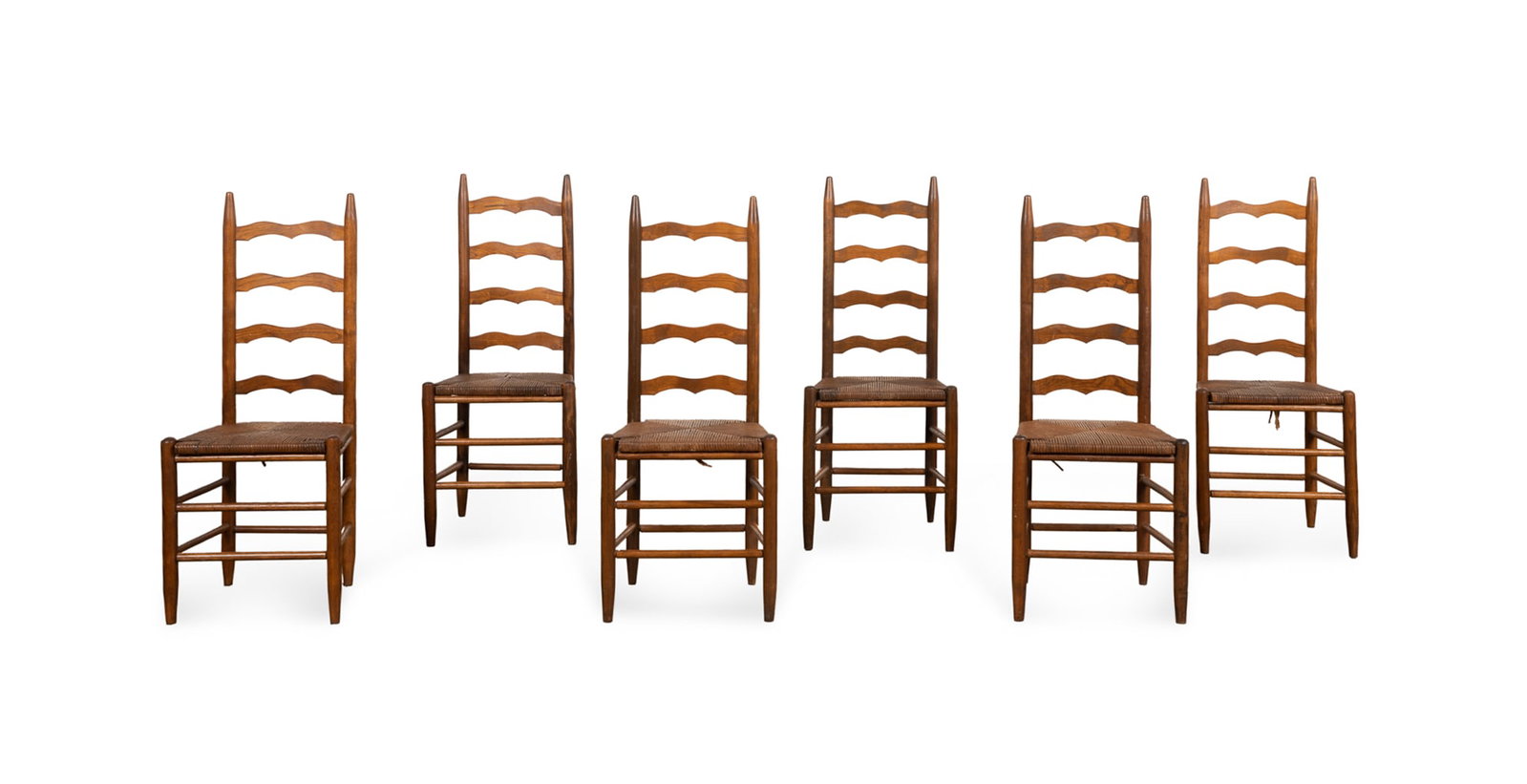 Six Farmhouse Ladderback Side Dining Chairs: Six Farmhouse Ladderback Side Dining Chairs 20th century, French Having oak frames with woven rush seats, apparently unmarked. Overall: 42 1/2 x 17 5/8 x 14 1/2 in. (108 x 44.8 x 36.8 cm.), Seat heigh