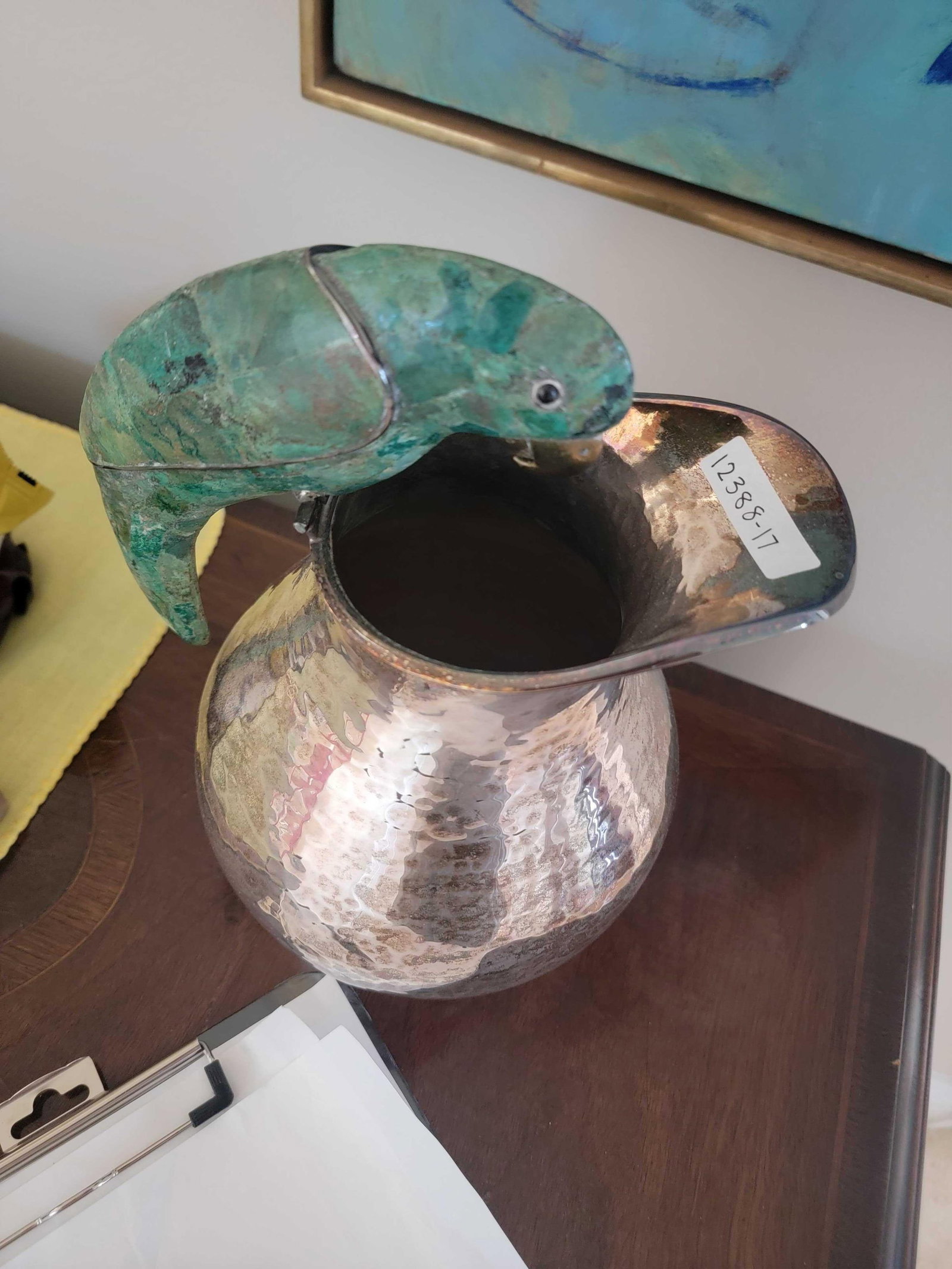 Los Castillo Malachite Parrot Silverplate Pitcher: Los Castillo Silverplate & Malachite Parrot Pitcher Los Castillo (Mexican, founded 1939), mid 20th century. Hammered silverplate and brass pitcher, having a malachite veneered parrot-form handle. Appr