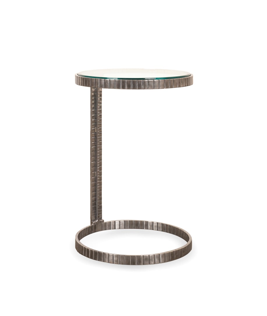 Paul Ferrante "Highland" Occasional Table: Paul Ferrante "Highland" Occasional Table Paul Ferrante (American, founded 1957), contemporary. Model number 6256, having a polished patterned steel frame, and circular glass top. Apparently unmarked.