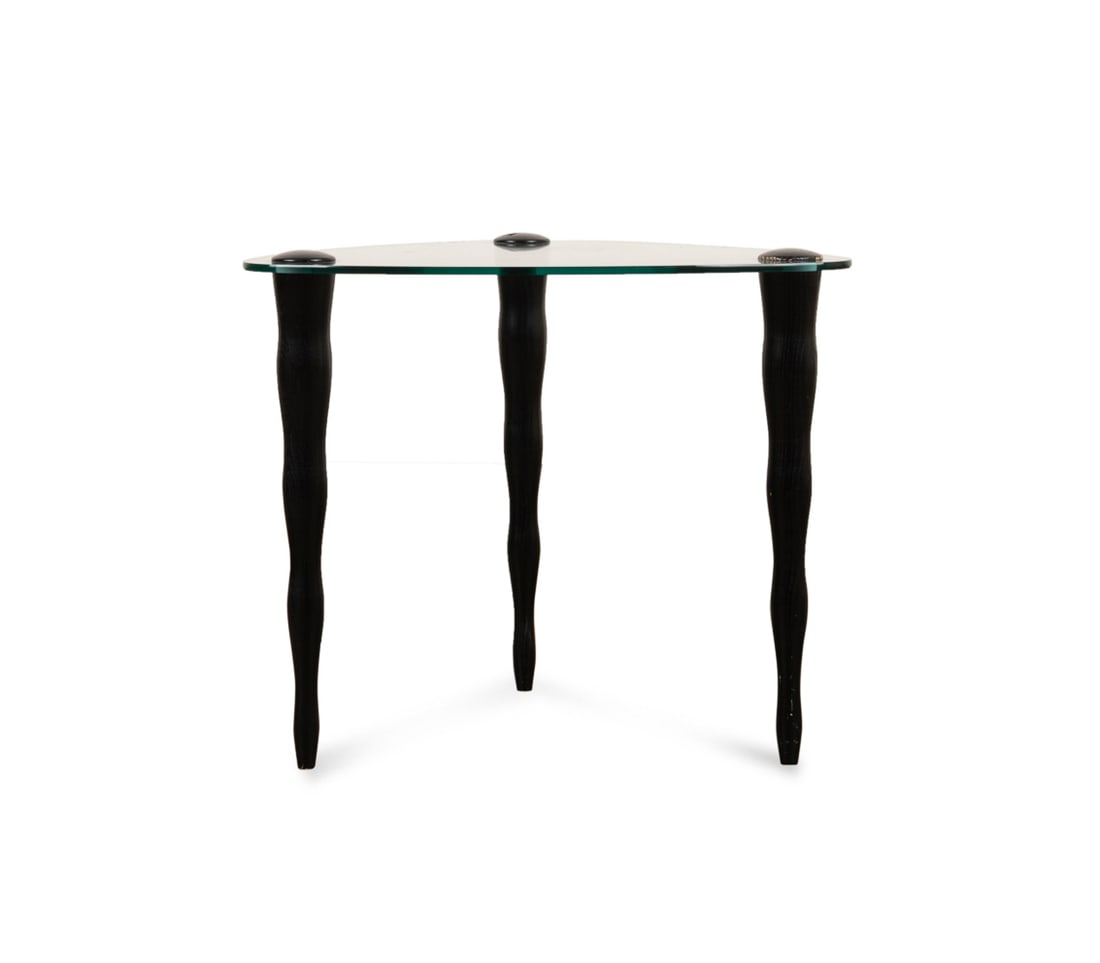 Postmodern Triangular Glass Top End Table: Postmodern Triangular Glass Top End Table Possibly American, late 20th to early 21st century. Having shaped tapered legs. Apparently unmarked. 23 1/2 x 26 1/2 x 21 1/2 in. (59.7 x 67.3 x 54.6 cm.) Pro