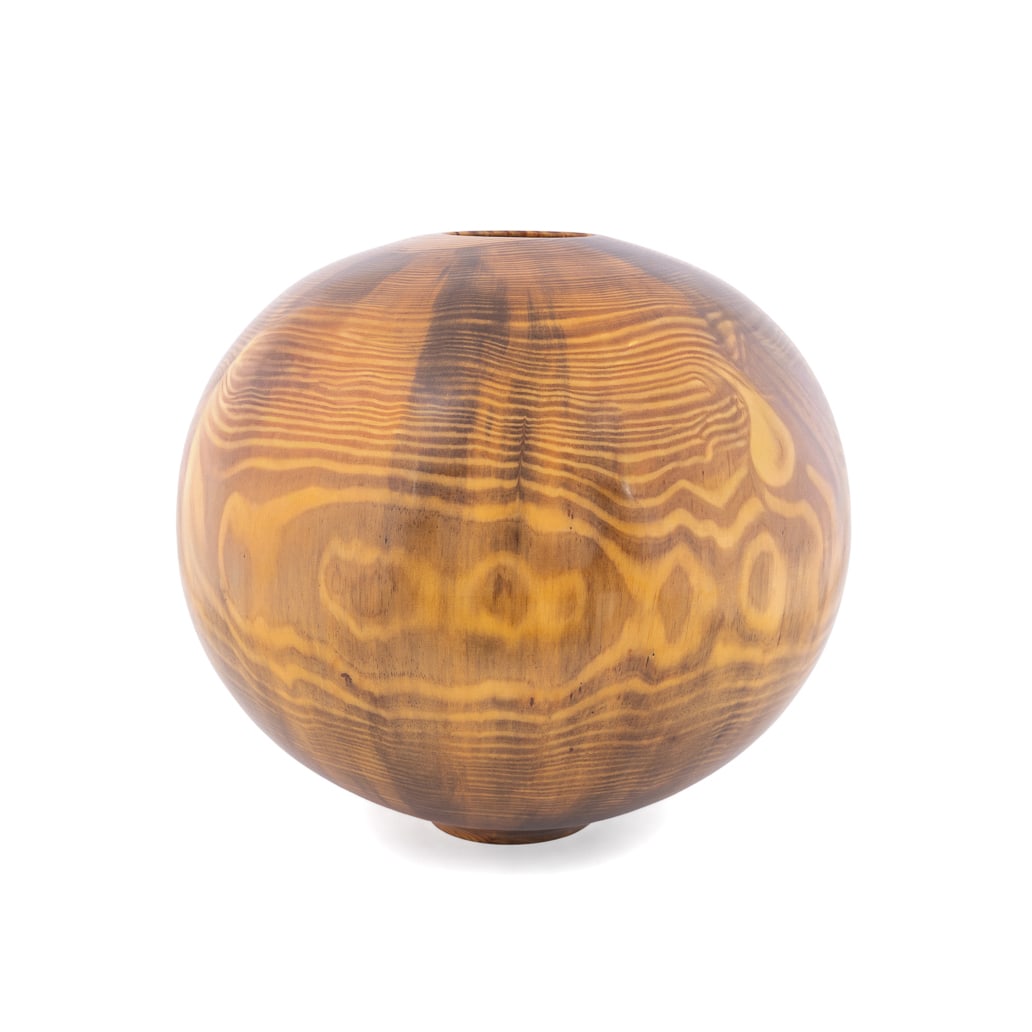 Philip Moulthrop, Oversized Streaked Pine Vessel: Philip Moulthrop American, born 1947 Turned Vessel Streaked Pine Signed, wood species, and numbered "6000010" and "803090R" to the underside. 17 3/4 x 19 1/4 x 19 1/4 in. (45.1 x 48.9 x 48.9 cm.) Pro
