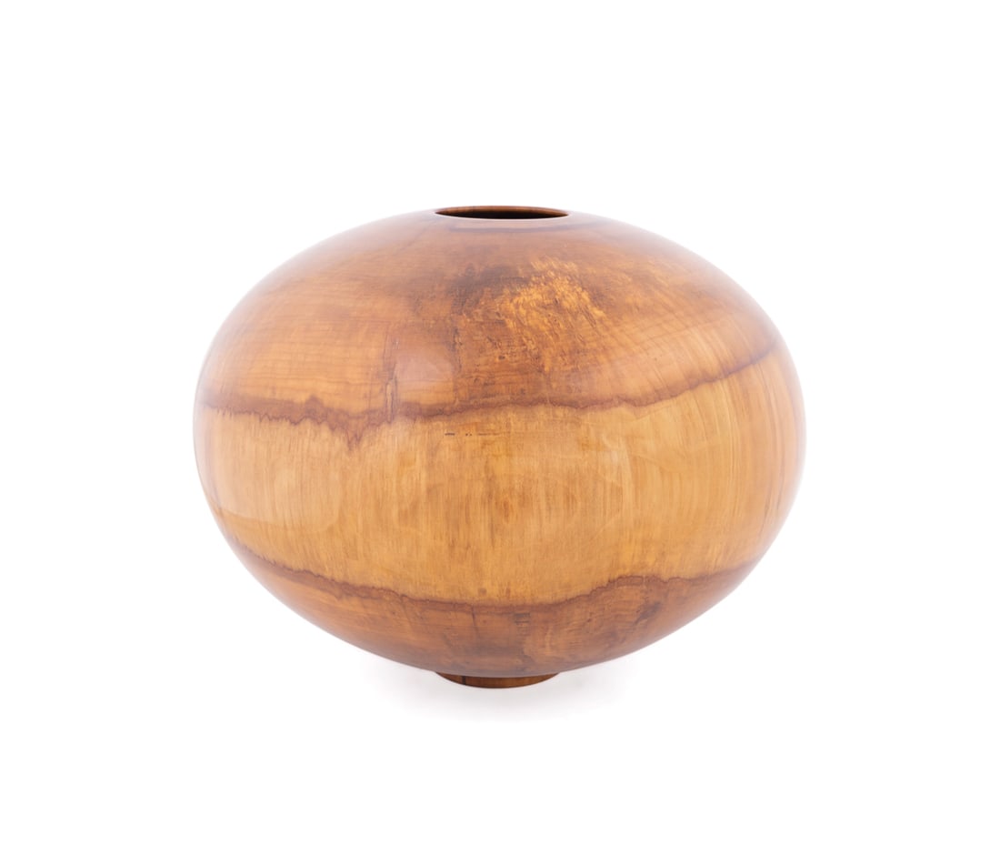 Philip Moulthrop, Large Figured Sweet Gum Bowl: Philip Moulthrop American, born 1947 Turned Footed Bowl Figured Sweet Gum Wood Signed, wood species, and numbered "132001" to the underside. 16 3/4 x 21 1/4 x 21 1/4 in. (42.5 x 54 x 54 cm.) Provenan