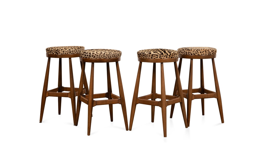 Four Animal Skin Upholstered Counter Stools: Set of Four Animal Skin Upholstered Counter Stools Late 20th Century, American Each having splayed walnut legs with copper wire wrapped stretcher. Impressed numeric notations to the underside, otherwi