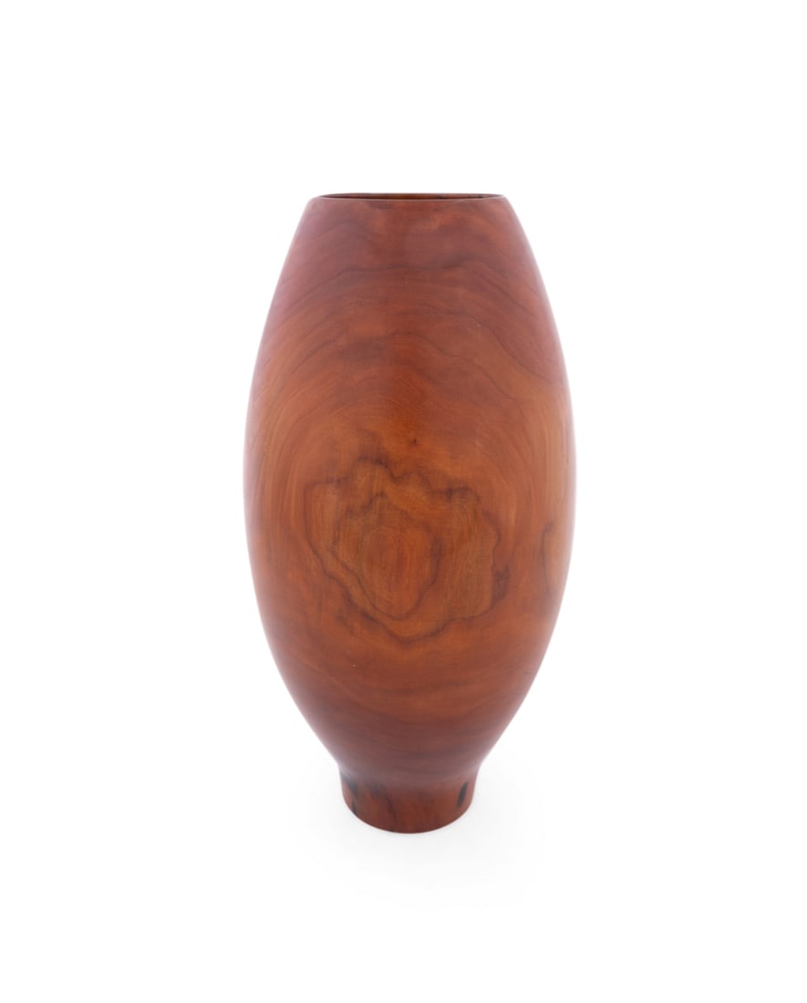Philip Moulthrop, Turned Wild Cherry Vase: Philip Moulthrop American, born 1947 Turned Wood Vase Wild Cherry Signed, wood species, and numbered 822021 to underside. 16 1/2 x 8 1/8 x 8 1/8 in. (41.9 x 20.6 x 20.6 cm.) Provenance: Private Colle