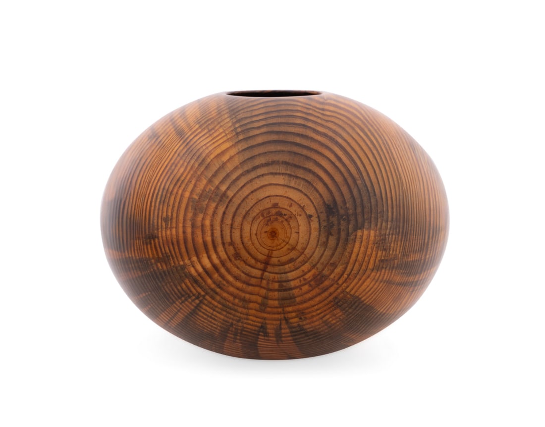 Philip Moulthrop, Turned Streaked Pine Bowl: Philip Moulthrop American, born 1947 Turned Bowl Streaked Pine Signed, wood species, and numbered "803090" to the underside. 10 1/2 x 14 1/4 x 14 1/4 in. (26.7 x 36.2 x 36.2 cm.) Provenance: Private
