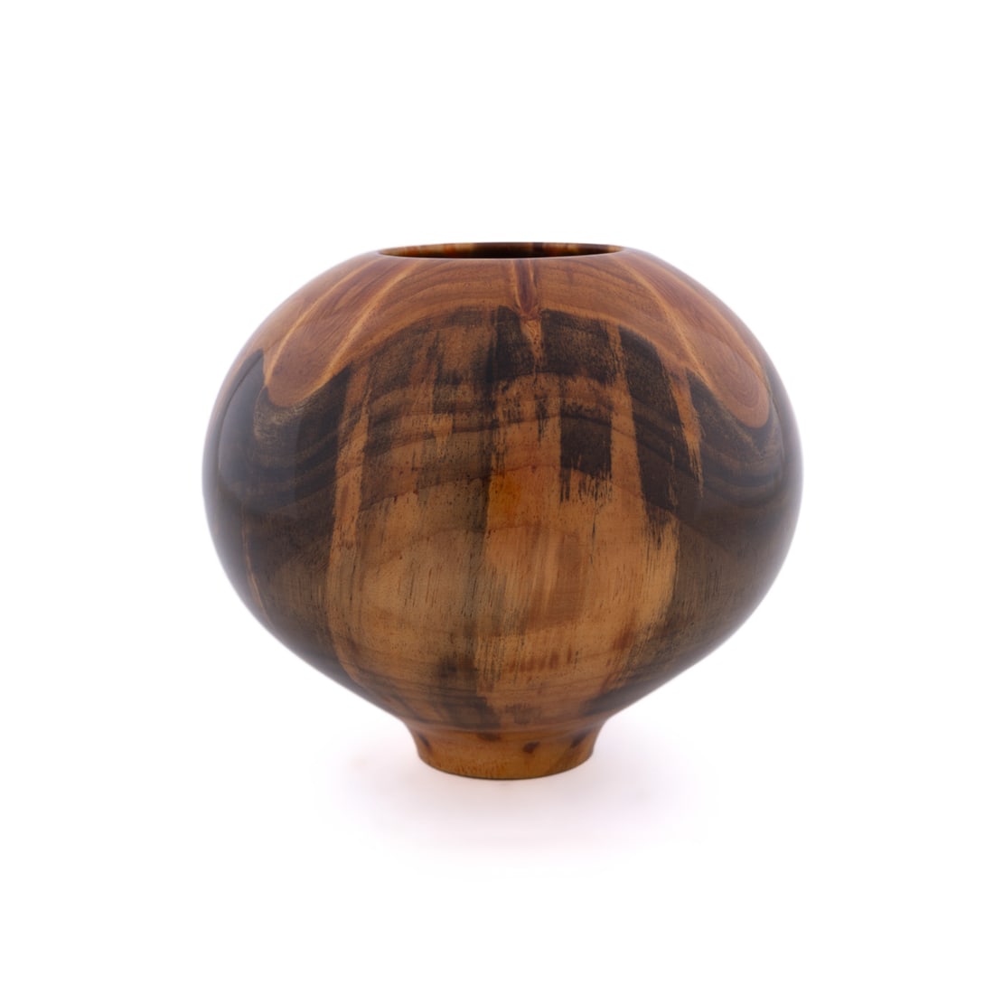Philip Moulthrop, Turned White Pine Node Bowl: Philip Moulthrop American, born 1947 Turned Wood Bowl White Pine Node Signed, wood species, numbered 013052 and sticker for Philip Moulthrop affixed to underside. 7 5/8 x 8 3/4 x 8 3/4 in. (19.4 x 22.