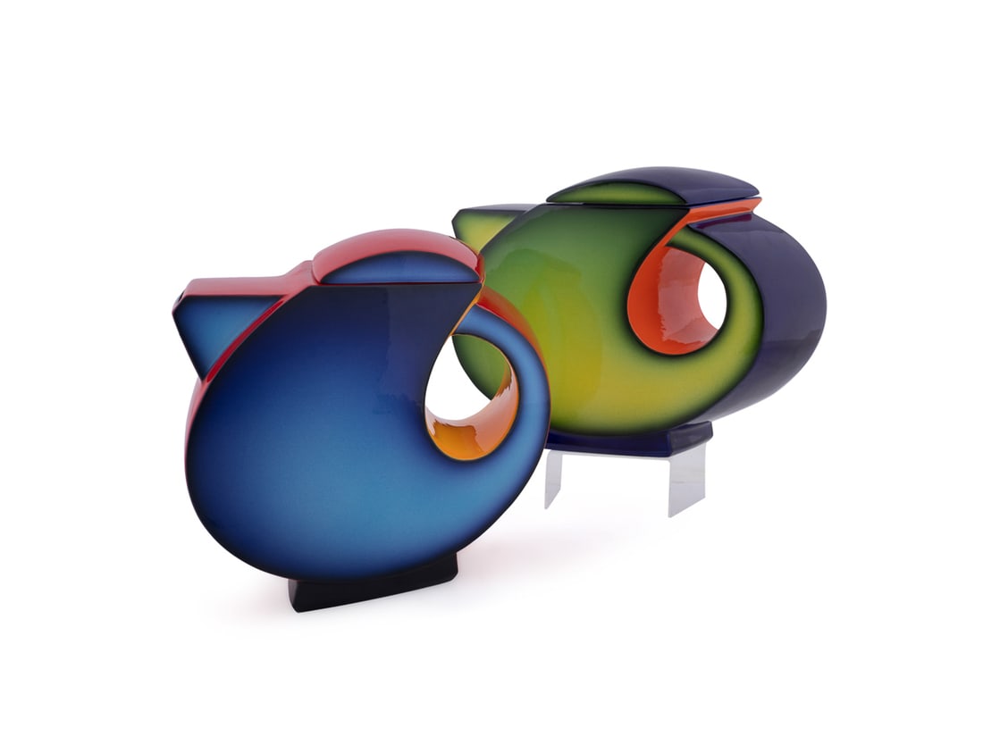 Fred Stodder, Two "Tea Bird" Glazed Teapots: Fred Stodder American, Born 1957 "Tea Bird - Blue" & "Tea Bird - Green" Glazed Earthenware Two large Pop Art style teapots. Both signed, and inscribed "TP-6 / 1/25" to underside. Both: 9 1/8 x 12 x 4 