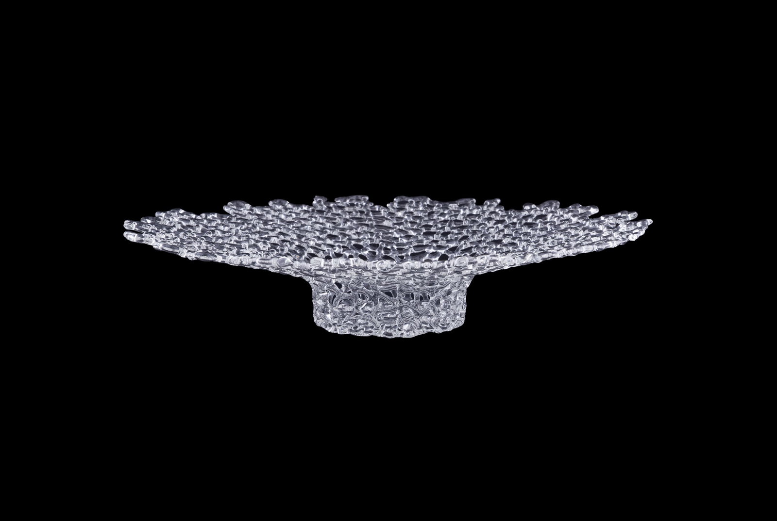 Hans Frabel, Openwork Art Glass Flared Rim Bowl: Hans Godo Frabel German, born 1941 Openwork Art Glass Flared Rim Bowl Glass Marked "Frabel" to inside of bowl. 4 3/8 x 21 3/8 x 21 3/4 in. (11.1 x 54.3 x 55.2 cm.) Provenance: Private Collection,