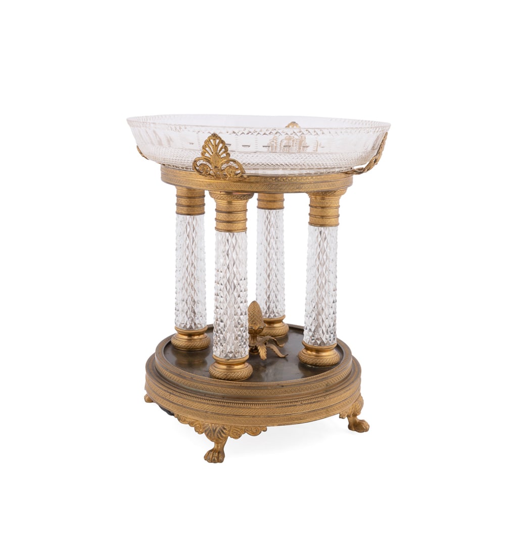Baccarat Gilt Bronze and Cut Glass Centerpiece: Empire Style Gilt Bronze and Cut Glass Centerpiece Baccarat (French, founded 1764), late 19th century. Having a colorless cut glass bowl and columns, centering on a pinecone, and rising on paw feet. A