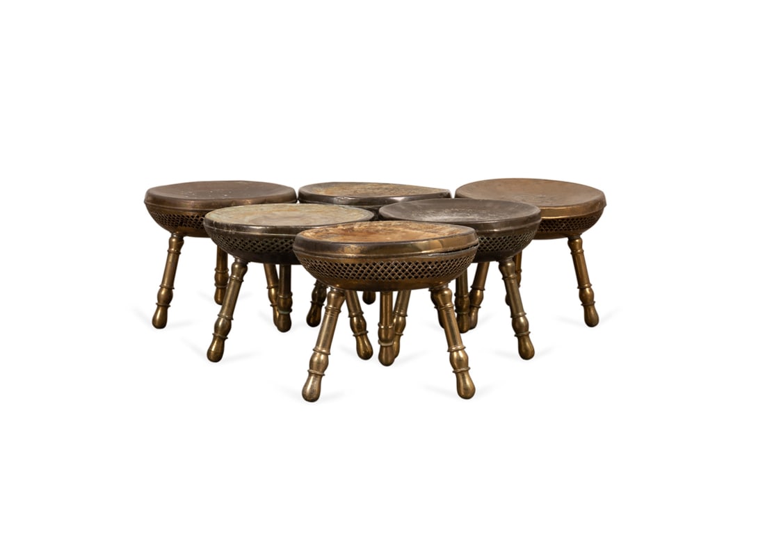 Indian, Set of Six Brass Foot Warming Stools: Set of Six Brass Foot Warming Stools 20th Century, Middle Eastern or Indian Each having a removable lid, pierced body, and rising on turned splayed legs. Apparently unmarked. 13 x 14 1/4 x 14 1/4 in.