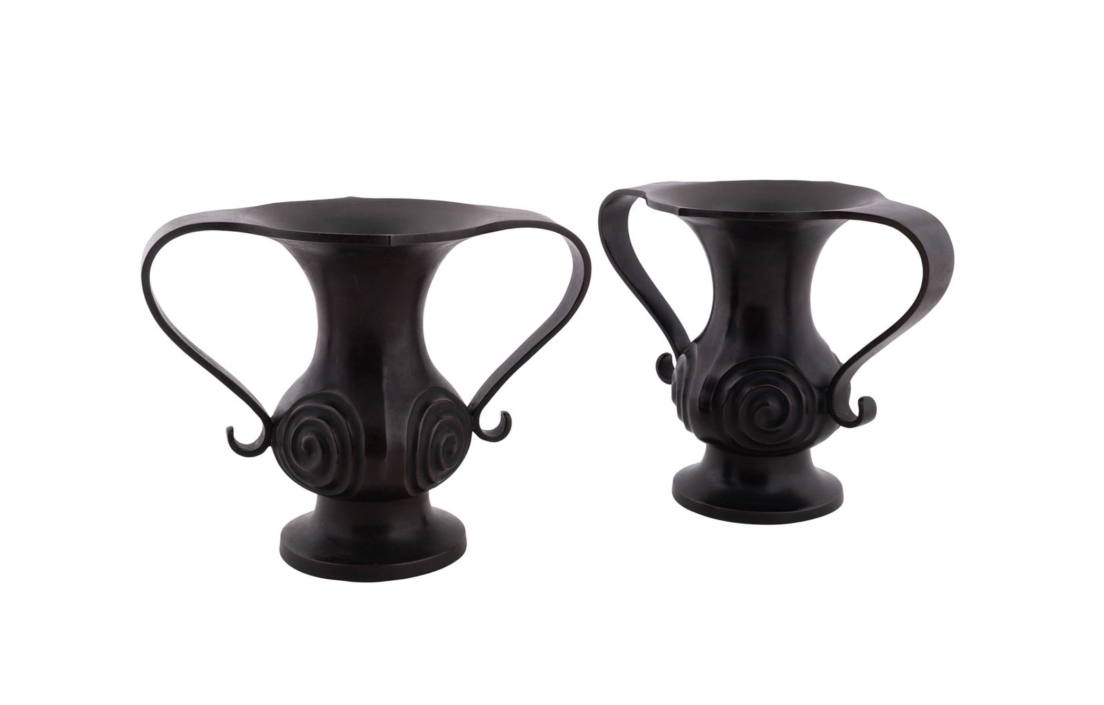 Pair of Japanese Mimikuchi Bronze Vases: Pair of Mimikuchi Bronze Flying Handle Vases Japanese Each flying handle "ear-mouth" shape footed vase having a swirl patterned body. Multiple character marks to the underside of each, one vase additi