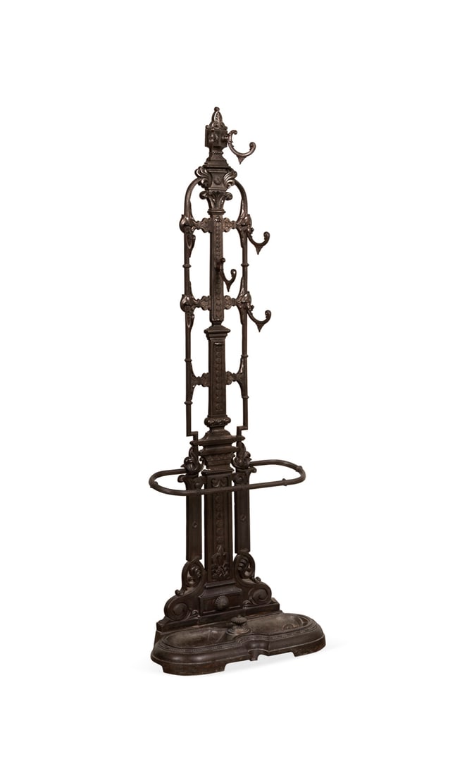 Victorian Style Cast Iron Hall Stand: Victorian Style Cast Iron Hall Stand 20th Century, Possibly American or European Having an anthemion crest, six hat / coat hooks, and ring for walking sticks / umbrellas with double drip pans. Intenti