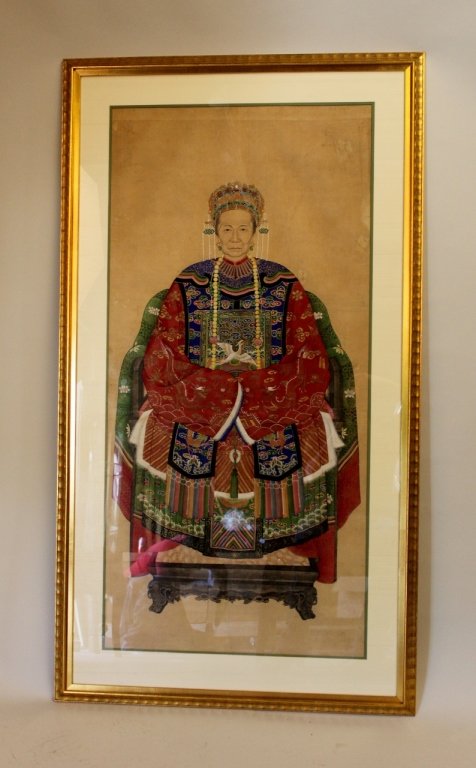19th Century Chinese Ancestor Portrait: The figure of a woman in ceremonial embroidered robes of red, green and blue color, double matted in contemporary gilt molding frame - 57"H x 31 3/4"W. Provenance: Dorothy Gay Poole Estate, Atlanta, G