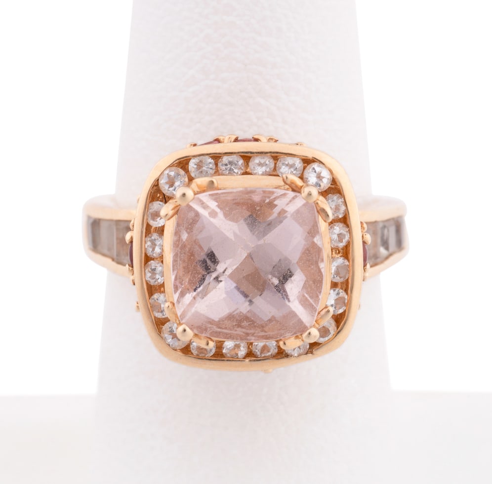 14K Yellow Gold, Morganite and Topaz Ring: Centering on a cushion shaped faceted morganite weighing approximately 2.60 carats, surrounded by twenty round cut colorless topaz, ring gallery displays four round cut colorless topaz at corners, fou