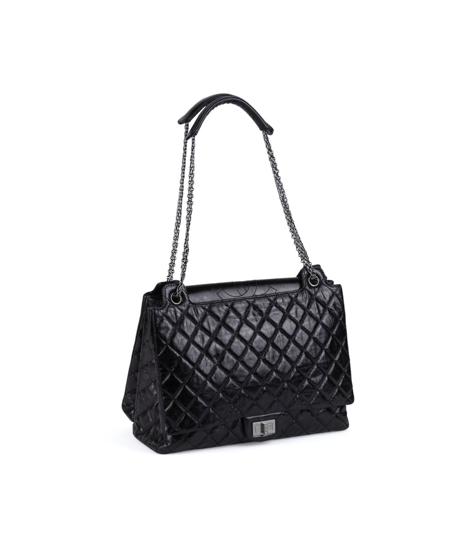Chanel Quilted Leather Reissue Accordion Flap Bag: Chanel (French, founded 1910). With adjustable chain strap, front flap with turn lock, partial interior flap with stitched CC logo, multiple interior compartments, and exterior back open pocket. Date 