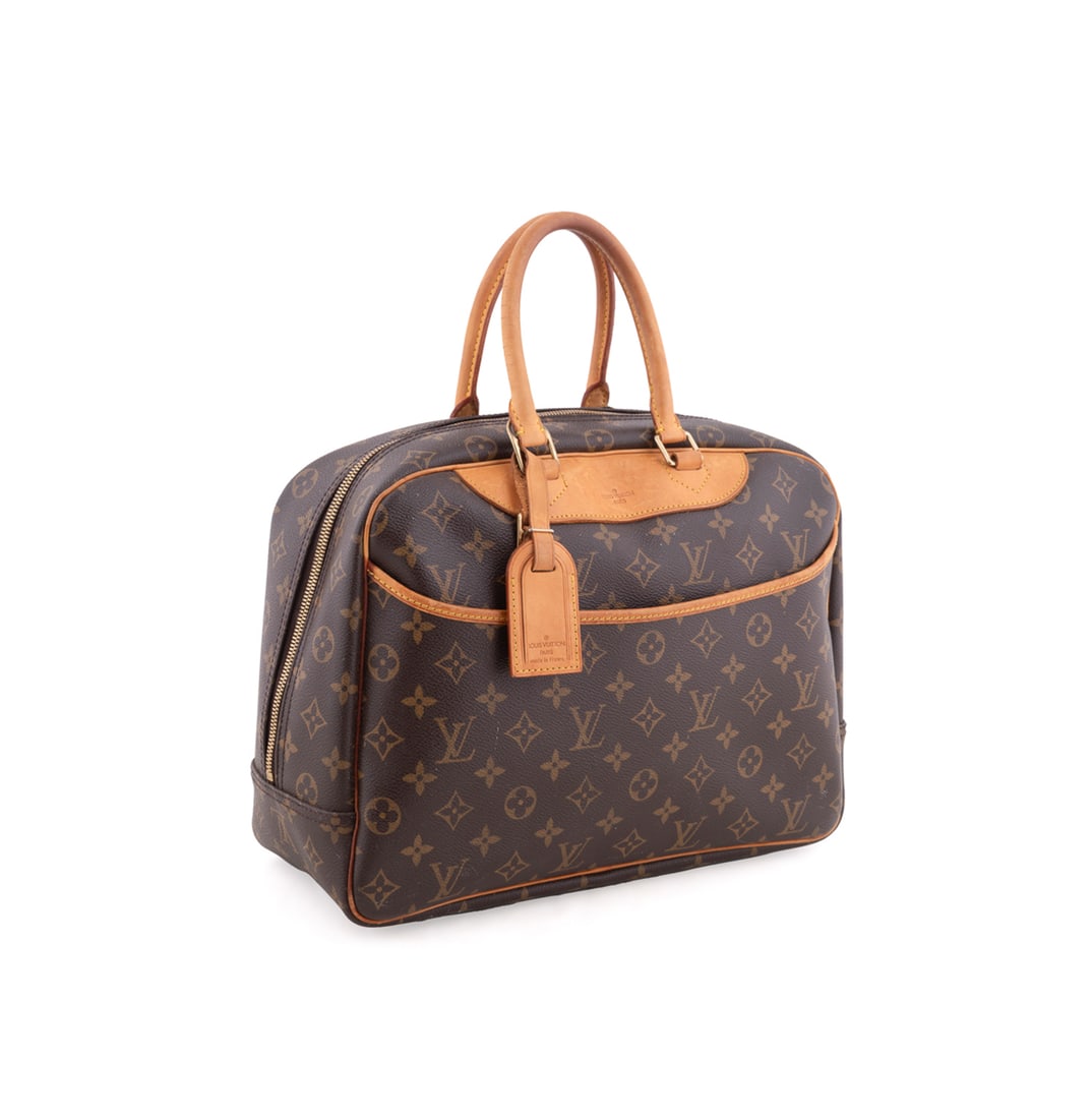 Louis Vuitton, Vtg. Monogram Deauville Handbag: Louis Vuitton (French, founded 1854), 2003. Vintage monogram canvas "Deauville" handbag with leather trims and handles, gold toned brass hardware, an external pocket, and a spacious interior compartme