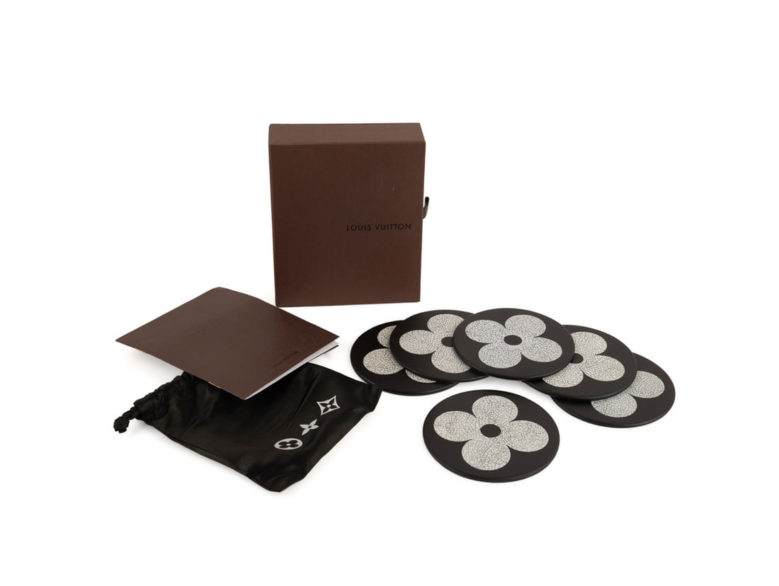 Louis Vuitton , 6 Lacquer and Eggshell Coasters: Louis Vuitton (French, founded 1859), circa 2009. VIP gift, each having the Monogram Flower pattern, with satin pouch in branded box. One coaster appropriately marked, the remainder apparently unmarke
