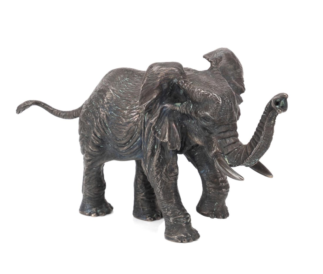 Kabana Sterling Silver Figure of an Elephant: Kabana (American, founded 1975), 20th / 21st century. Sterling silver animal figural sculpture modeled as a standing elephant, marked to the underside of raised foot. Limited edition noted as 13/500. 