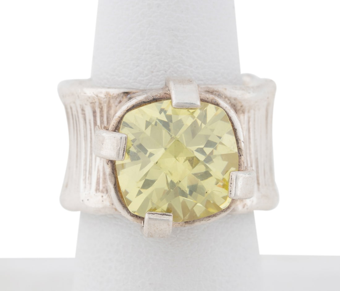 Modern Lime Citrine Sterling Silver Ring: With a cushion checkerboard cut lime citrine approx. 12 x 12 mm. Unmarked, Acid tested as sterling silver. Approximate dimensions: US ring size 8 total weight 16.24 grams. Note: Direct credit card pay