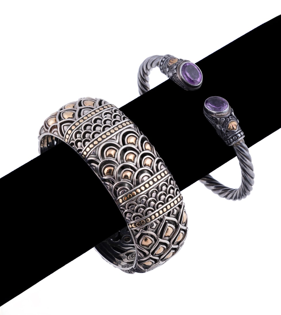 Two Sterling Silver and Yellow Gold Bracelets: Including one John Hardy 'Legends Naga' cuff featuring detailed dragon-scale texturing and open-work in silver with 14K yellow gold accents, and one cable twist hinged bangle bracelet with floral engr