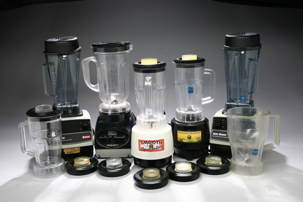 A Group of Blenders.: Including 5 blenders, 7 blender pitchers (4 standard size, 3 large), and 11 blender tops.