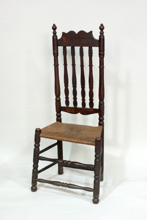 Bannister Back Chair, Mid-18th Century: Spindle back side chair with rush seat, William & Mary Period, from New England (likely Connecticut or Massachusetts). Height 43 inches, width 14.75 inches, depth 12.75 inches. Seat to floor 16.5 inch
