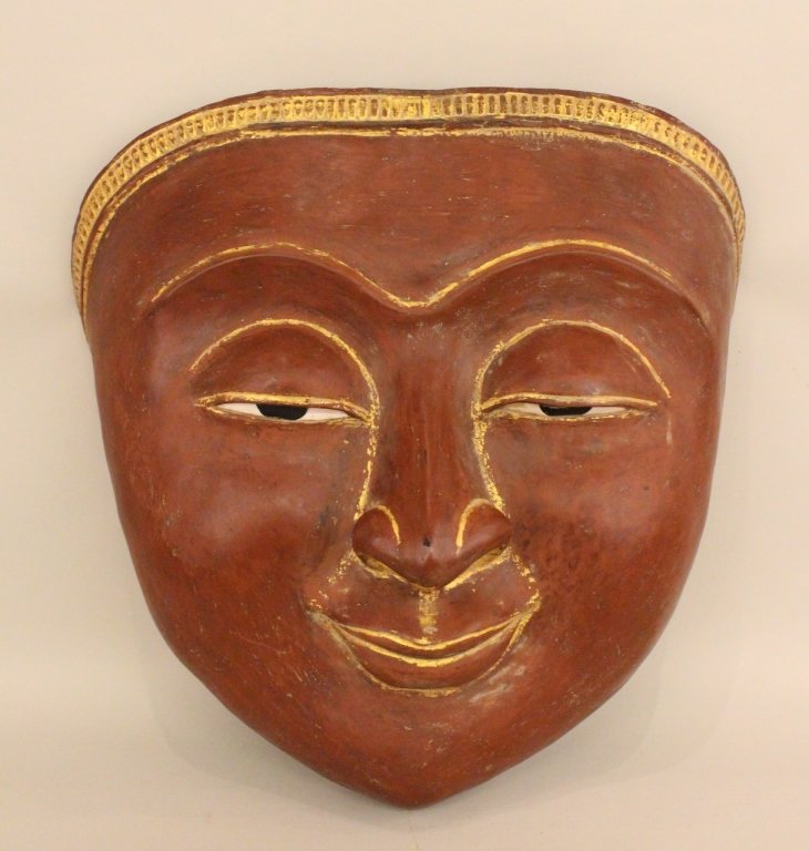Large Asian Paper Mache Mask.: Of facial form and with gold accents on facial features and at top. Height 29 inches, width 39 inches, depth 7 inches.