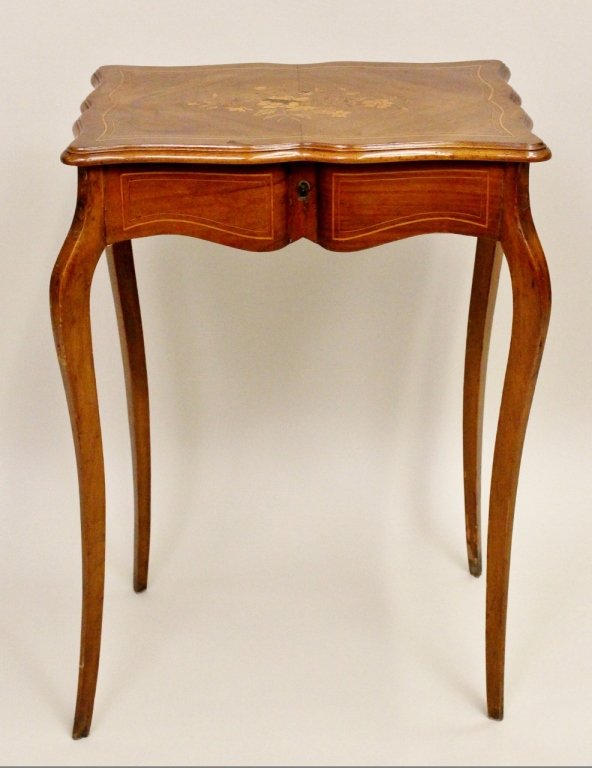 French Walnut Dressing Table: Small vanity/dressing table with inlaid floral decoration on table top. Hinged lift top with mirrored interior. Height 28.5 inches, width 19.5 inches, depth 14.5 inches.