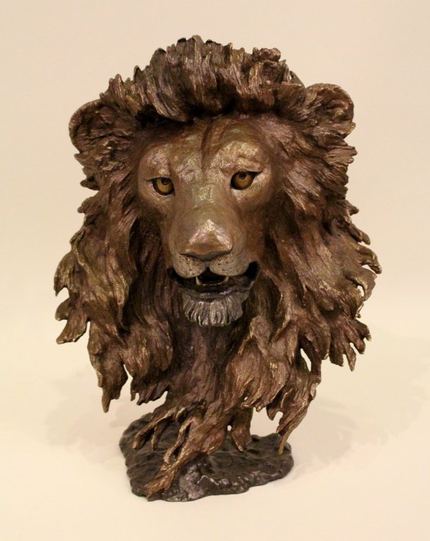 Bronze Lion's Head Sculpture by Mark Hopkins: Mark Hopkins (American 20th Century). Titled "Guardians of the Plains". Of a lion's face with mouth open and a flowing mane. Lion's head raised on a rock form base. Signed, copyright dated and numbere